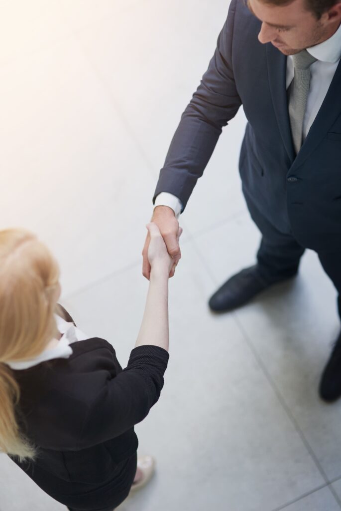 top view business people handshake deal success b2b agreement agent corporate office shaking hands meeting introduction welcome thank you collaboration 2
