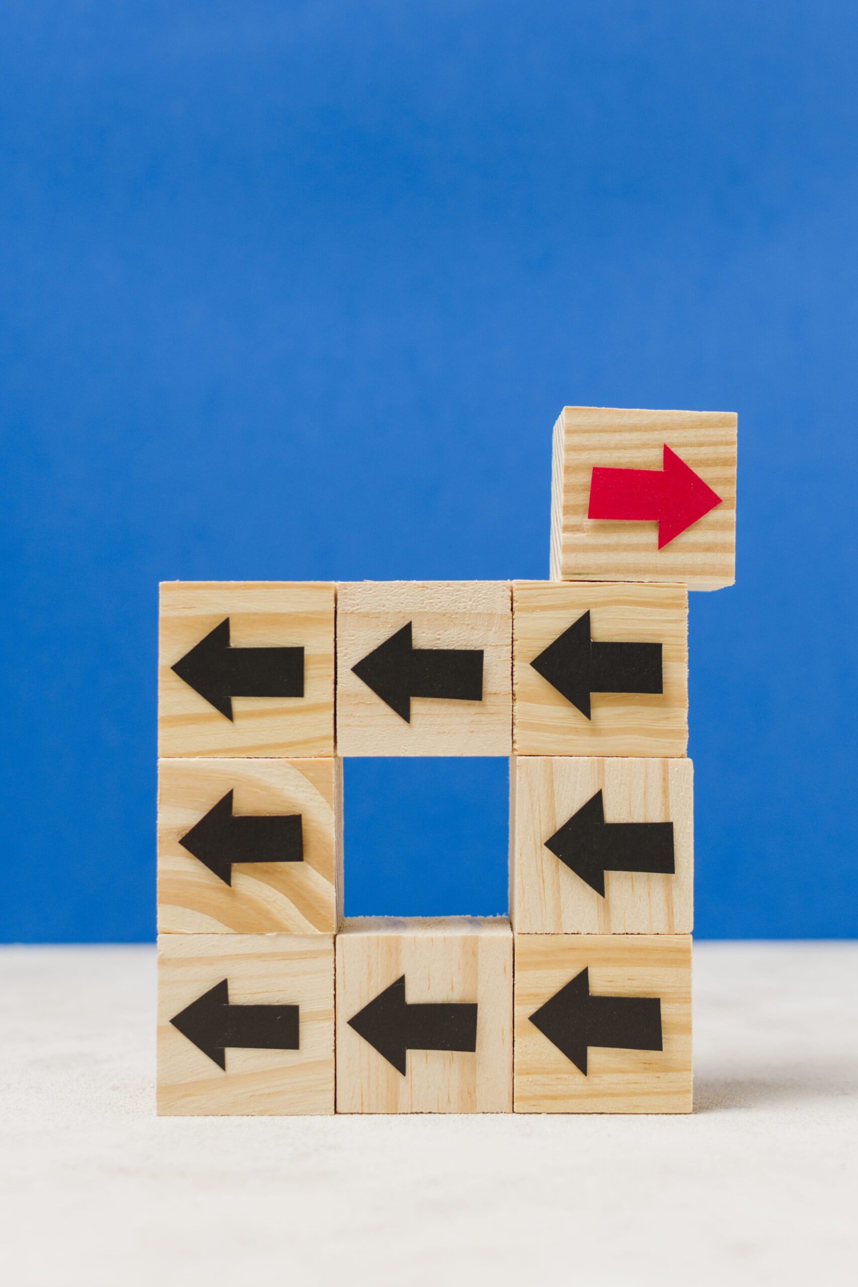 wooden cubes with arrows originality concept 2